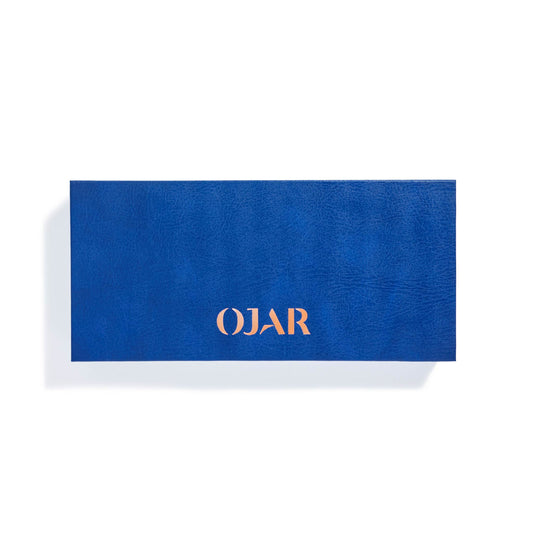Blue leather box with 'OJAR' branding on a white background