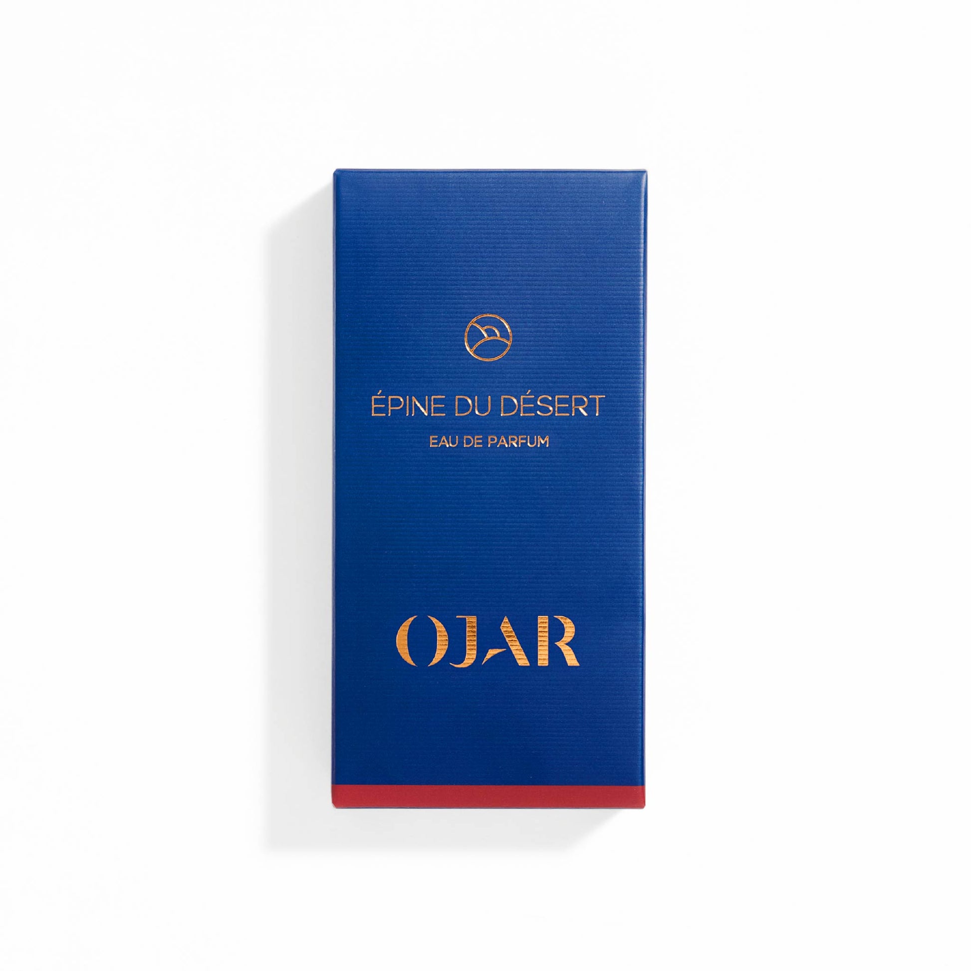 Blue OJAR perfume box labelled as 'Epine Du Desert Eau De Parfum' with gold text on a white background