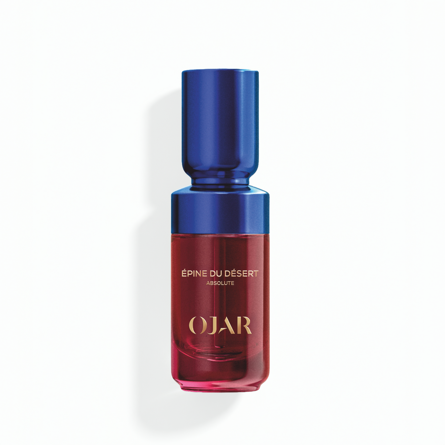 Absolute Perfume Oil bottle in 20ml by OJAR with blue cap and red body labelled as 'Epine du Desert' on a white background