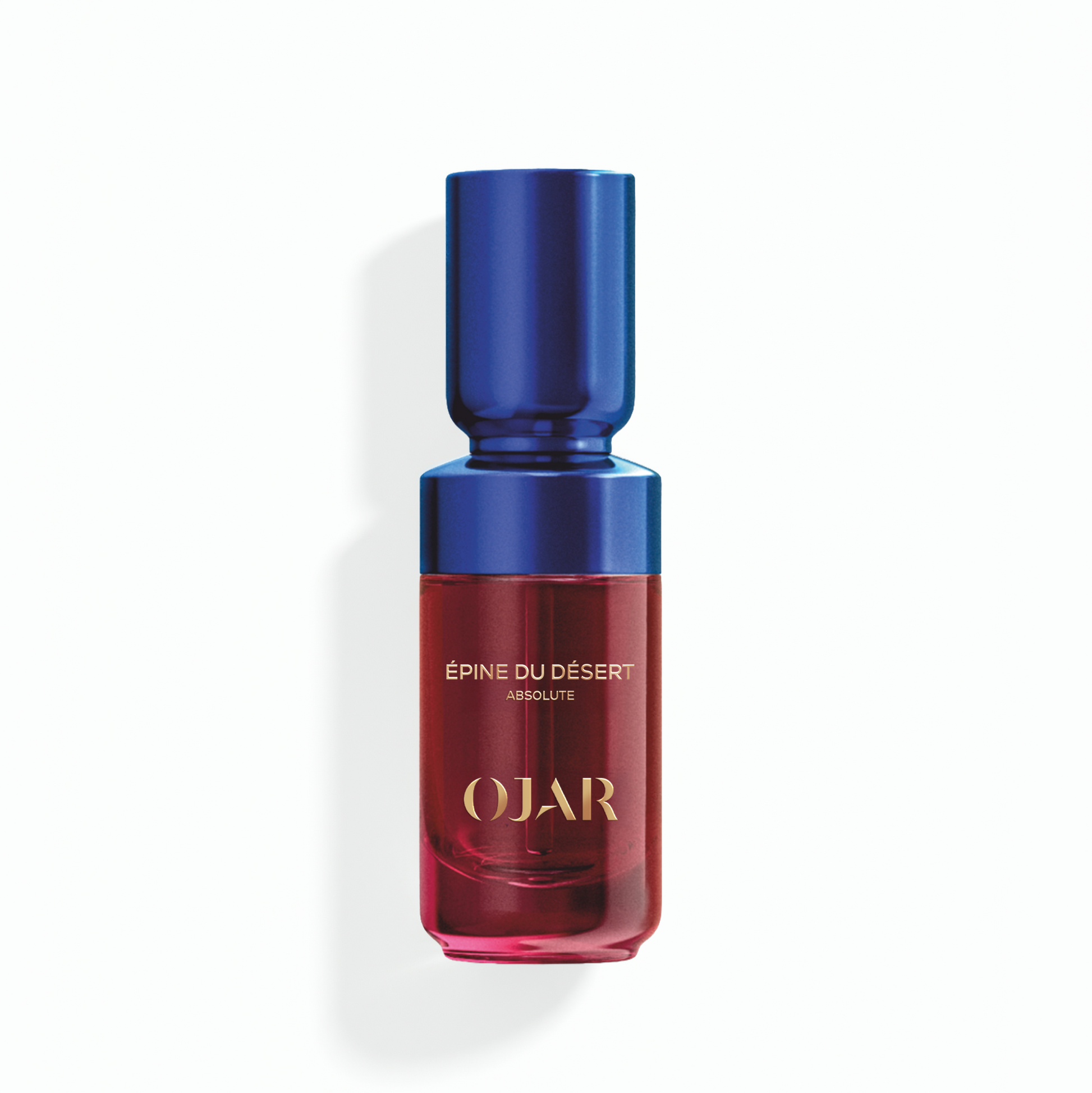 Absolute Perfume Oil bottle in 20ml by OJAR with blue cap and red body labelled as 'Epine du Desert' on a white background