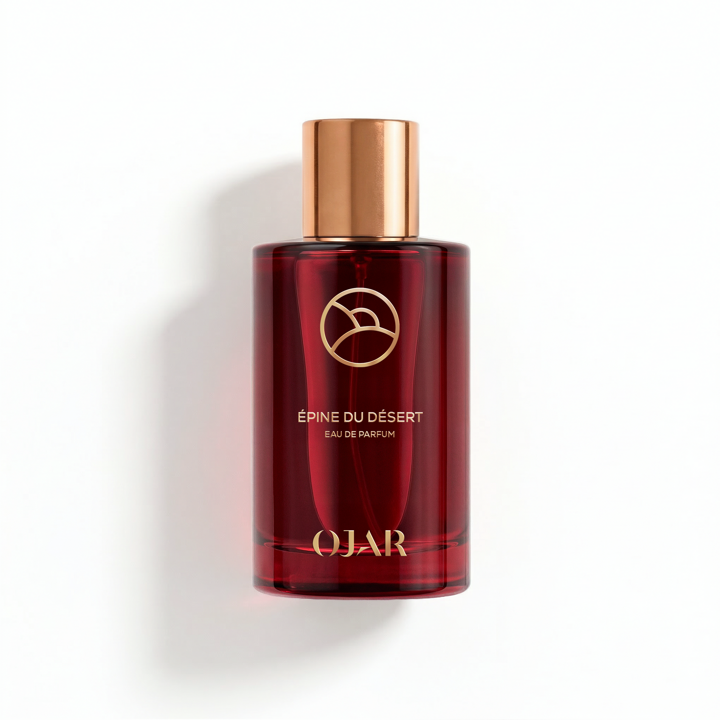 OJAR EPINE_DU_DESERT_EDP 100ML Red perfume bottle with gold cap on a white background