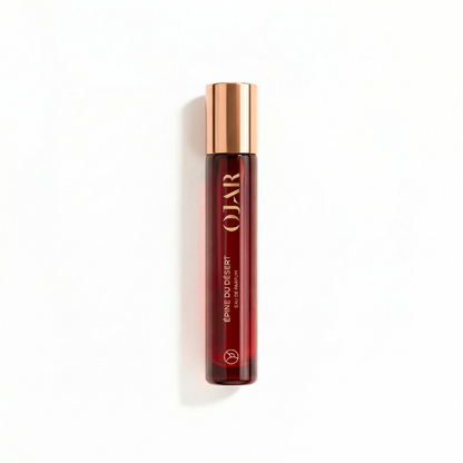 OJAR EPINE_DU_DESERT_ EDP 15ML IN A RED BOTTLE WITH A BRONZE CAP AGAINST A WHITE BACKGROUND