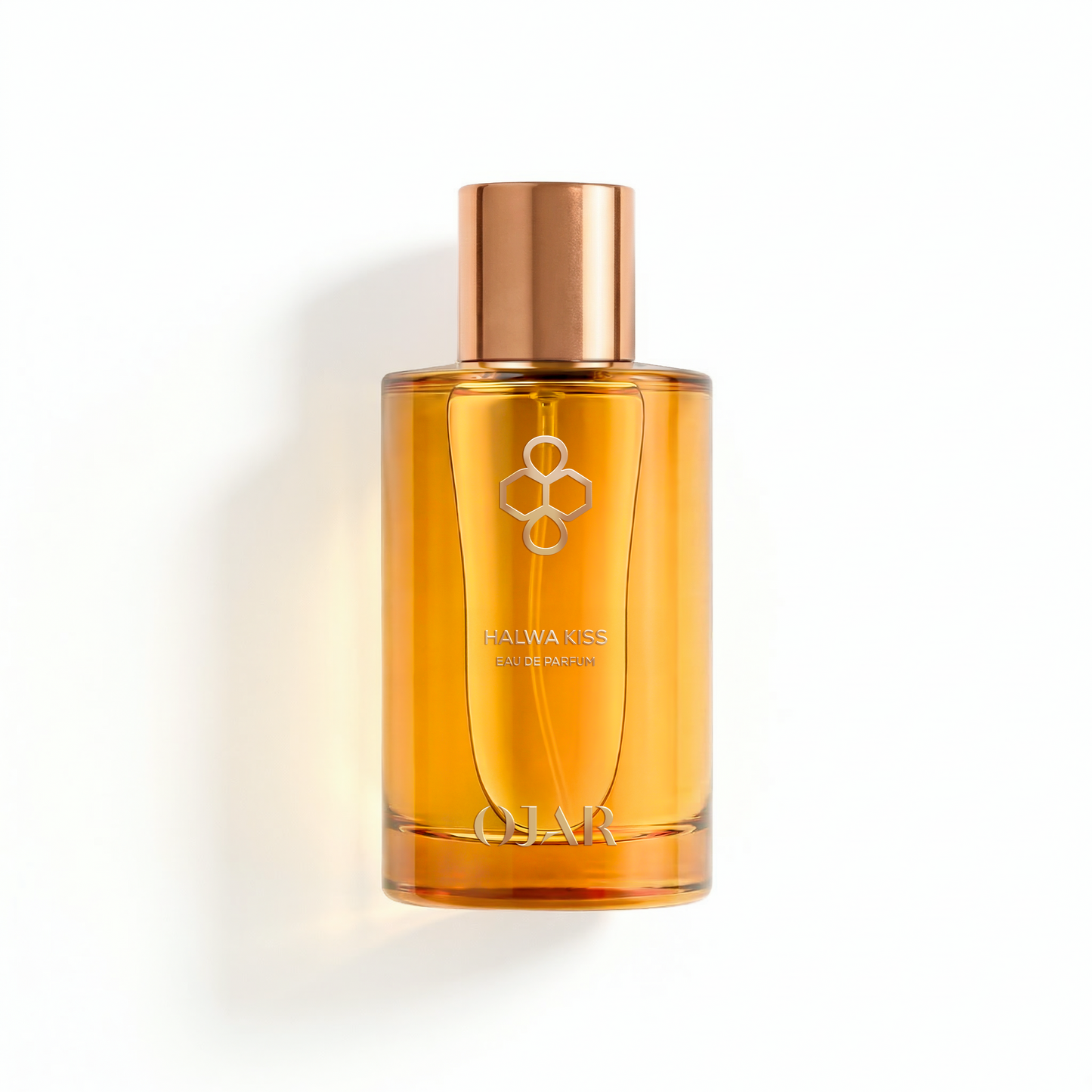 OJAR HALWA_KISS_EDP 100ML Amber-colored perfume bottle with a copper cap on a white background