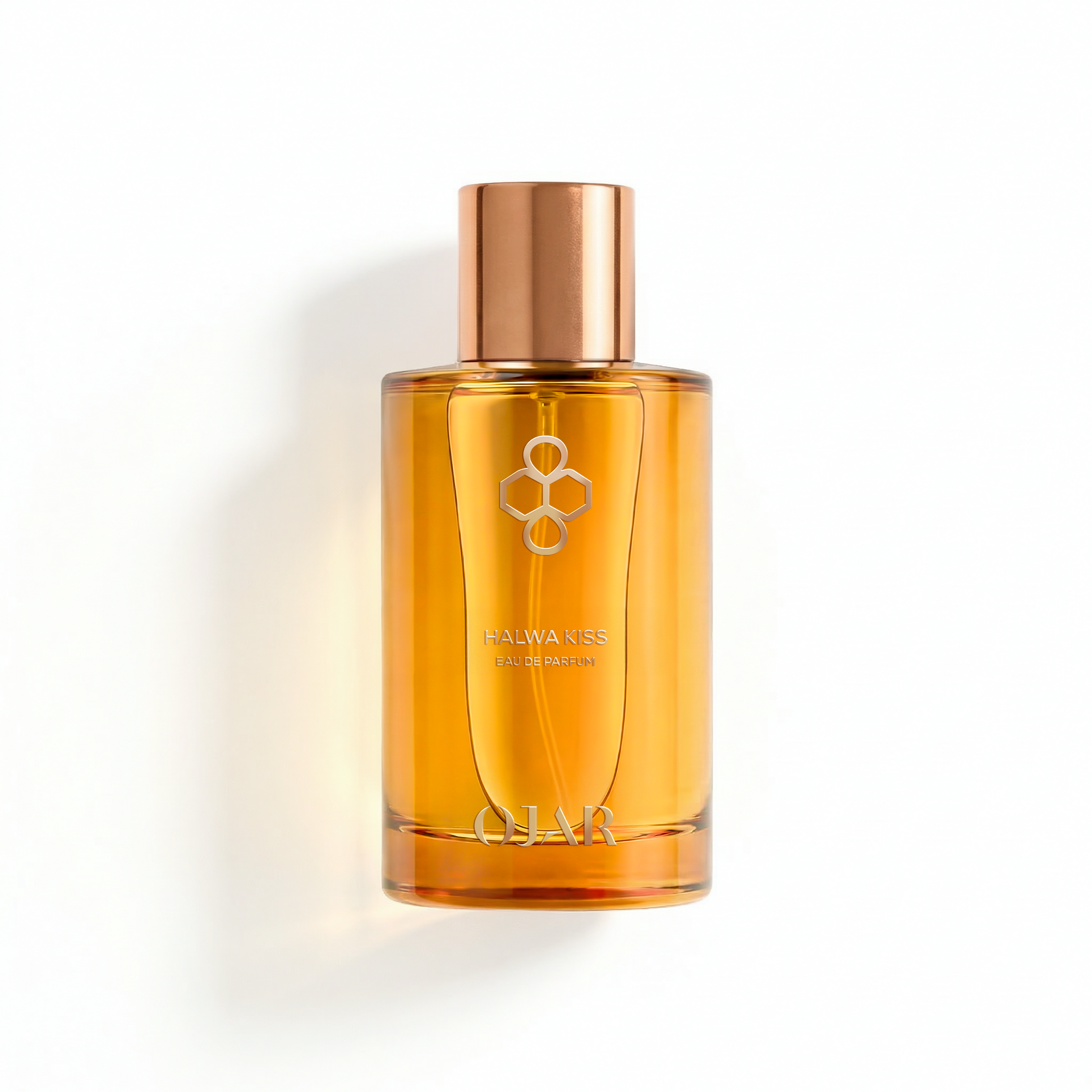OJAR HALWA_KISS_EDP 100ML Amber-colored perfume bottle with a copper cap on a white background