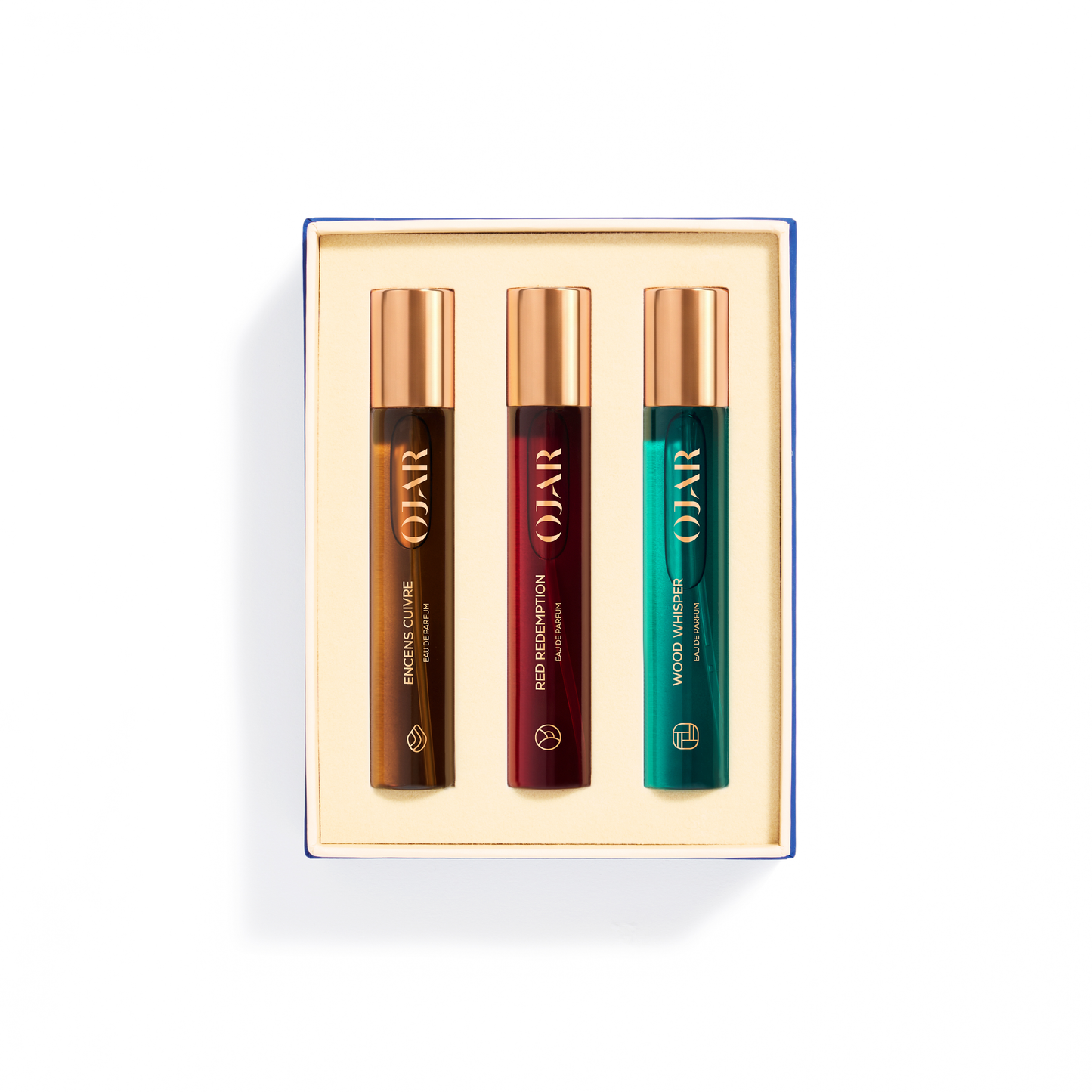 Three OJAR perfume bottles in travel size 15ml in a box on a white background