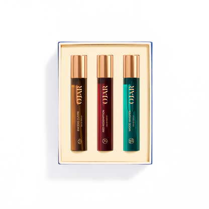 Three OJAR perfume bottles in travel size 15ml in a box on a white background