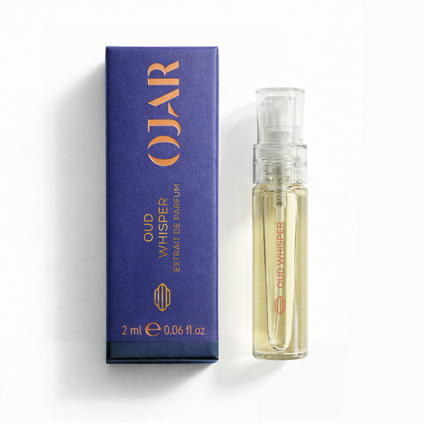Ojar Oud Whisper EDP 2 ml perfume bottle and packaging on a white background