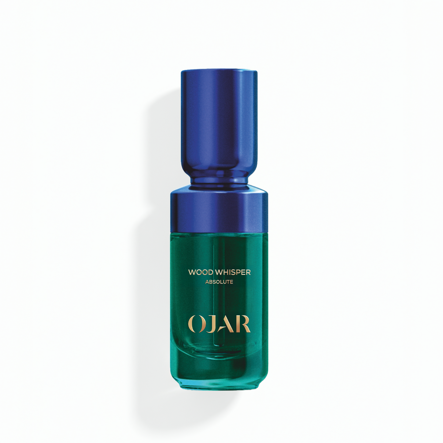 OJAR Wood Whisper Absolute perfume oil in 20ml bottle with blue cap and green body on a white background