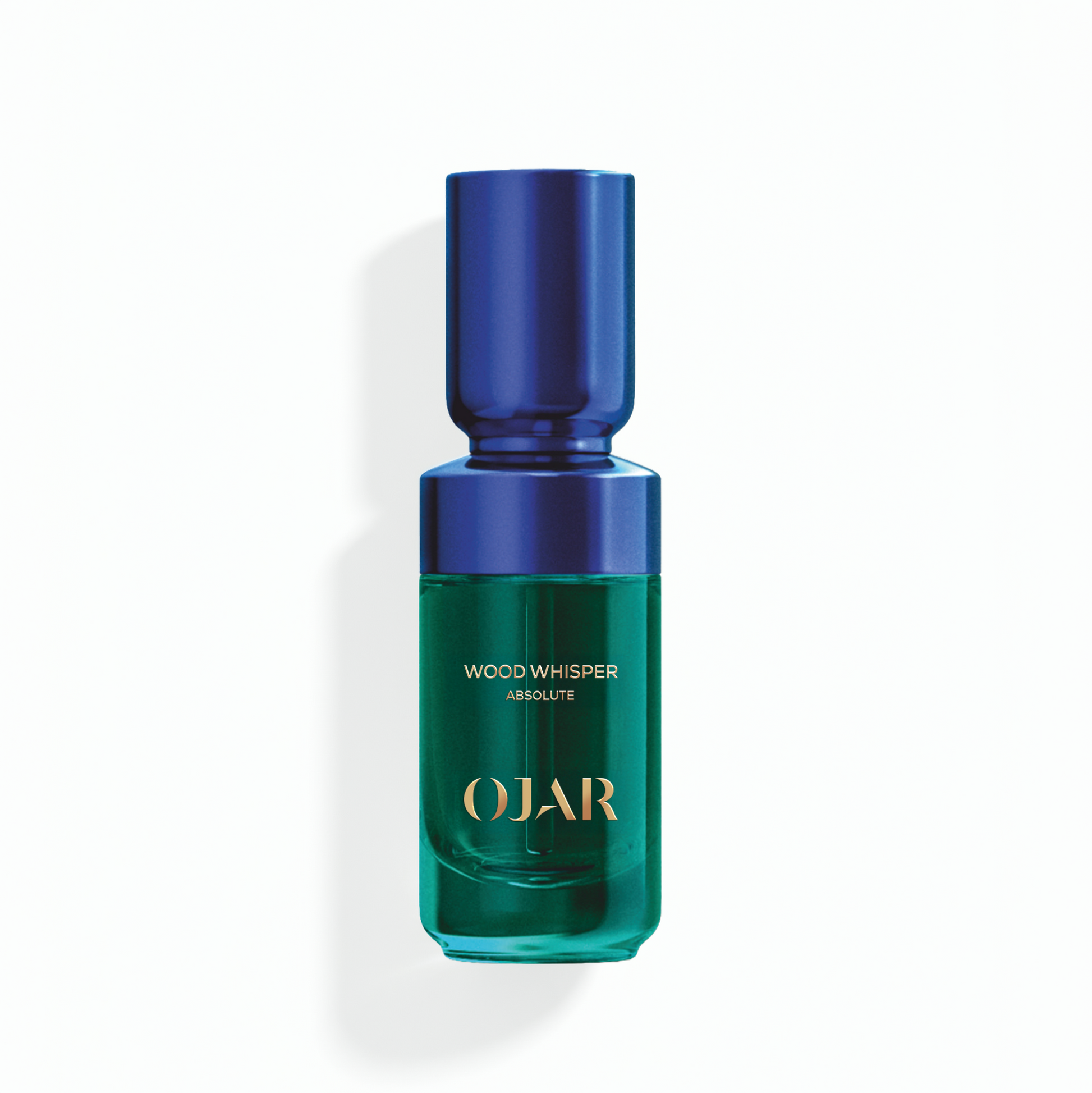 OJAR Wood Whisper Absolute perfume oil in 20ml bottle with blue cap and green body on a white background