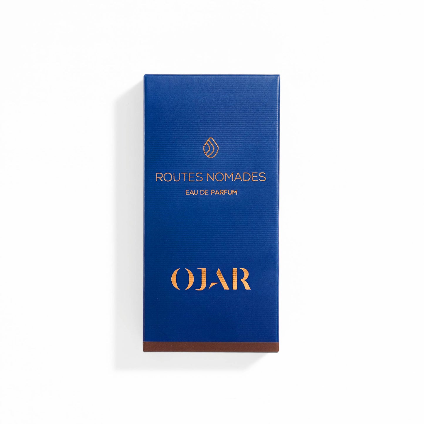 Blue box of Routes Nomades Ojar Eau de Parfum in 15ml on a white background